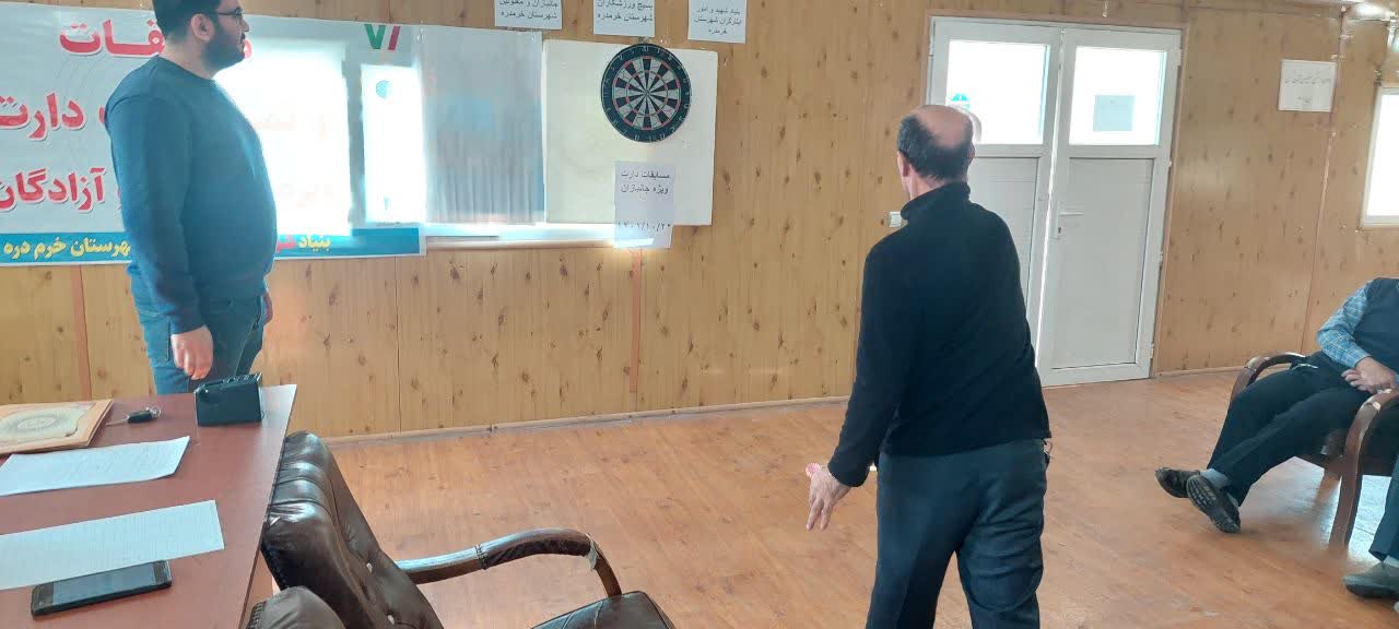 جانبازان و آزادگان شهرستان خرمدره رقابت ورزشی در رشته دارت2